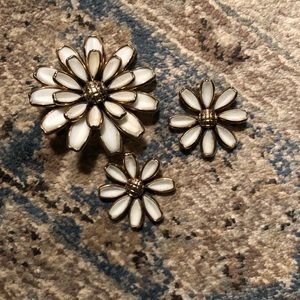 1940’s Trifari poured glass daisy flowers.